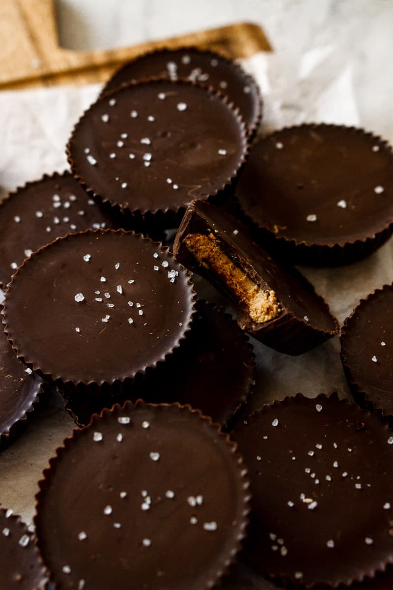 Chocolate almond butter cups on parchment paper