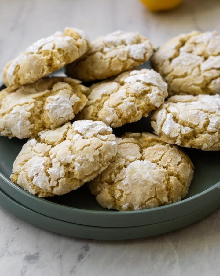 Meyer lemon crinkle cookies on a serving plate